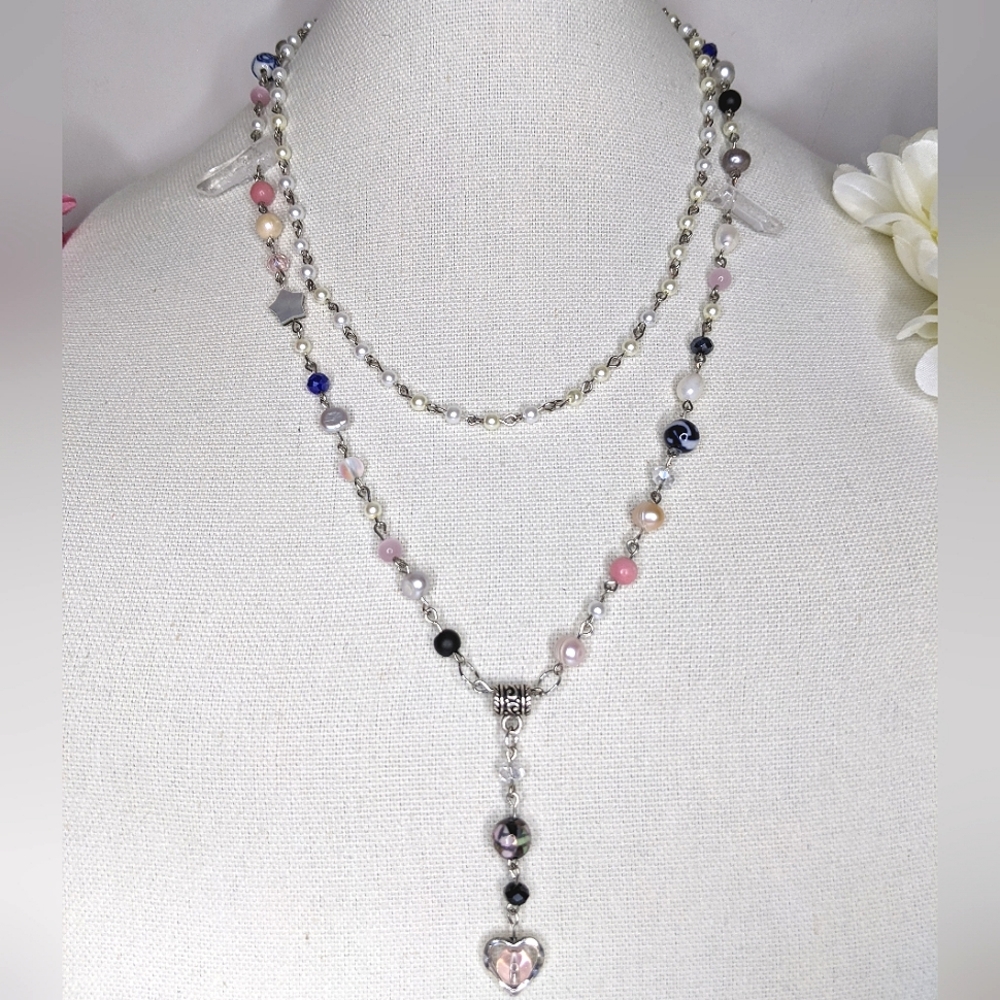 Long freshwater pearl necklace with pink,blue and black beads. Handmade by me.